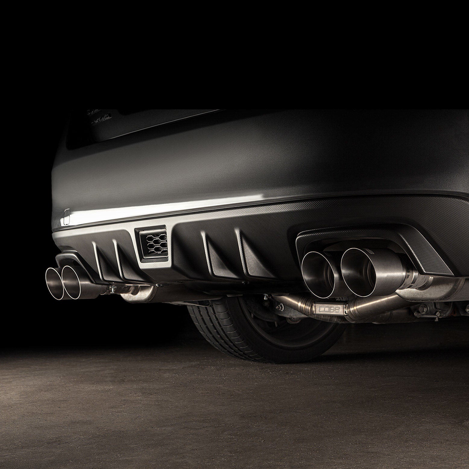 Cobb Brushed Titanium Tips Shown Installed